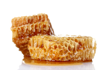 Combs with honey isolated on white