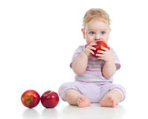 Baby boy eating healthy food isolated