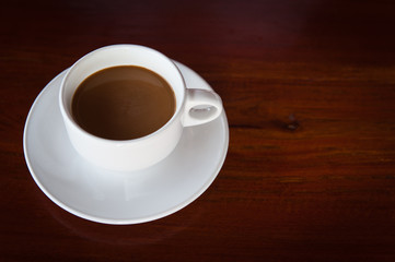 Coffee on wooden background