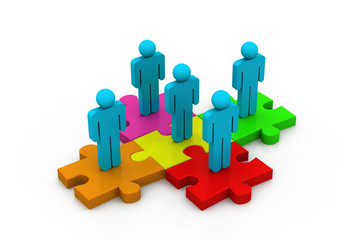 People are standing on colored pieces of jigsaw puzzle.