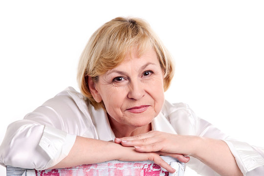 Smiling mature woman over white background