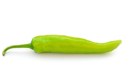 Green hot chili pepper on white