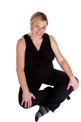 Hochschwangere Frau bei der Gymnastik