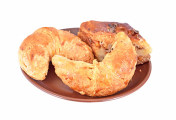 Homemade crescent roll with nut on plate