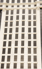 White Stone Building with Black Windows