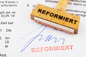 Holzstempel auf Dokument: Reformiert