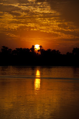Sunset over a large river