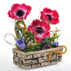 Ceramic flowerpot with artificial flowers