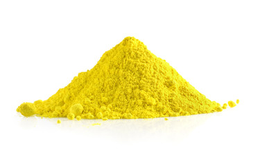 Pile of yellow powder on white