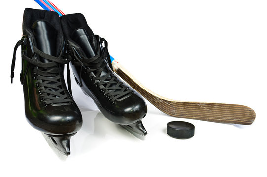 Hockey skates and stick