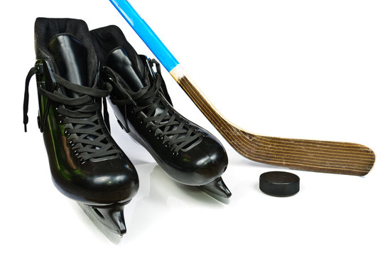 Hockey skates and stick