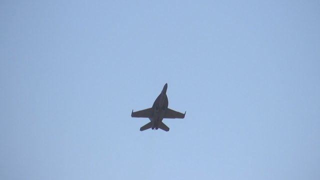 Modern fighter jet in slow flight