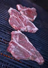 steaks on grill