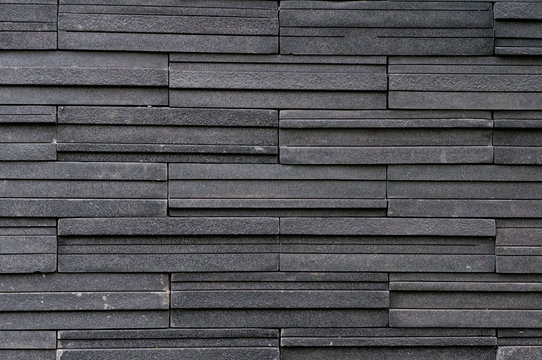 Dark stone tile texture brick wall surfaced