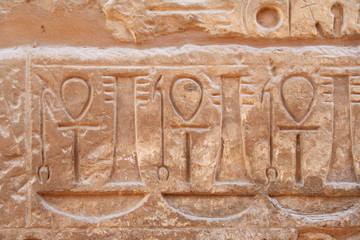 Carvings of ankhs on the wall