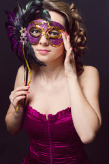 single beautiful woman in carnival mask