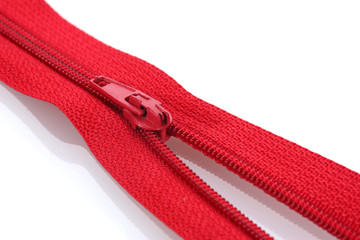 Red zipper closeup © Africa Studio