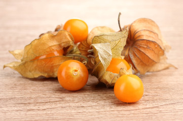Physalis heap on wooden background