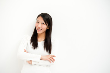 attractive asian woman relaxing in the white room