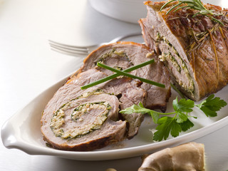 rolled veal stuffed with nuts, ginger and parsley