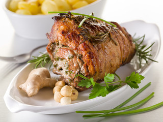 rolled veal stuffed with nuts, ginger and parsley