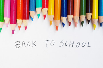 Colorful pencils on white background