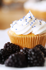 Cupcake with blackberries