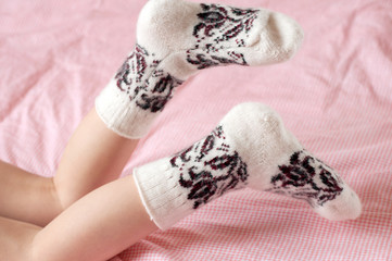 Children's feet in wool socks