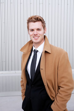 Young Business Man In Trenchcoat