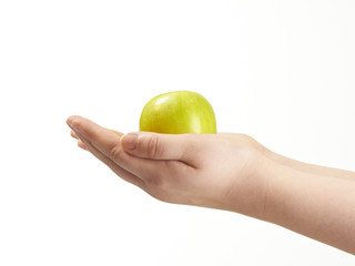Apple in the palms of childs hands