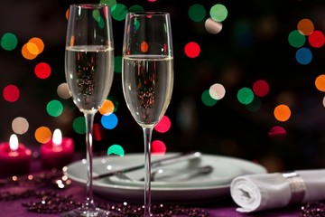 Christmas table setting with sparkling wine