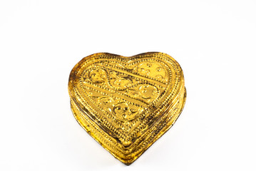 Golden heart on a white background