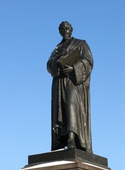 Fototapeta na wymiar Statue of Hugo Grotius a poet and jurist in the Dutch history
