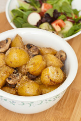 Fototapeta premium Delicious baked potatoes with parmesan cheese