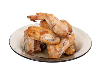Fried chicken wing on plate