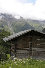 Fototapeta na wymiar Swiss chalet in Lauterbrunnen Valley, Switzerland