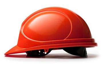 Red safety helmet on white
