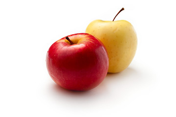 Red and yellow apples on white