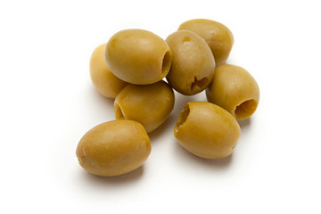 Heap of green seedless olives