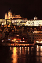 View on Prague gothic Castle with Charles Bridge in the Night