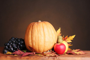 Naklejka na ściany i meble pumpkin, apples, grapes and leaves