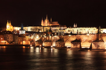Prague gothic Castle with Charles Bridge in the Night