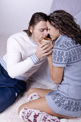 Young happy couple at home
