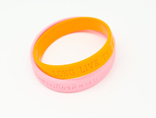 Yellow and pink rubber bracelet