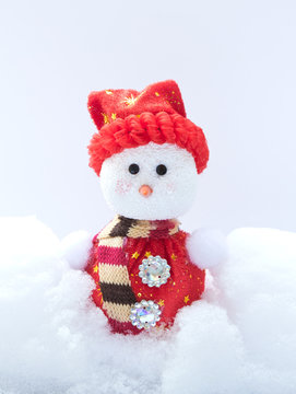 Happy snowman with hat and scarf