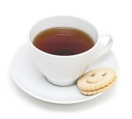 cup of tea and smiling cookie