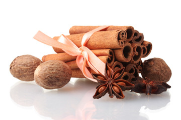 Cinnamon sticks, nutmeg and anise isolated on white