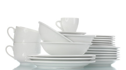 empty bowls, plates and cups isolated on white