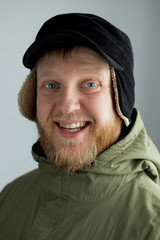 Cheerful young man in a hat