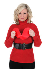 Young Woman Tearing Paper Heart Apart